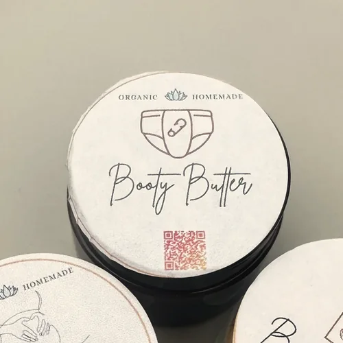 Jar of Baby Booty Butter, a homemade diaper cream.